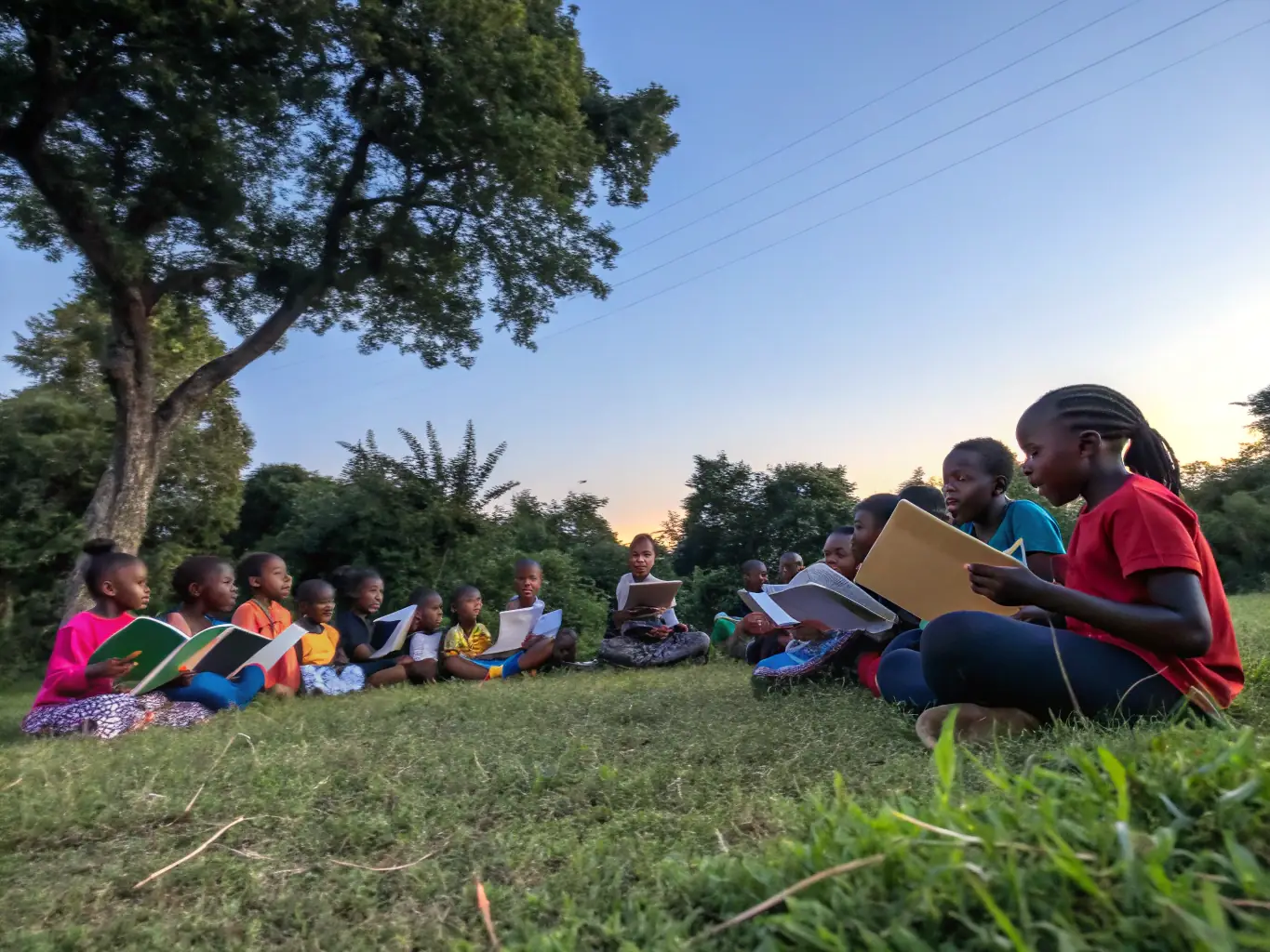 A heartwarming image of children participating in an interactive storytelling session, surrounded by colorful books and engaging props.